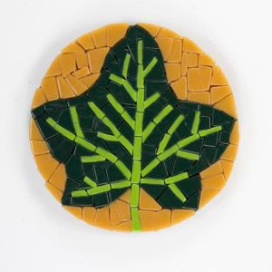 Mosaic coaster made from recycled glass tile using no grout gap.
