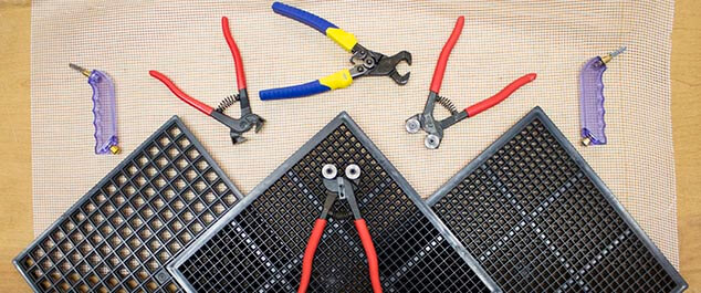 Top down view of mosaic nippers tools mesh and grids for use in mosaic art
