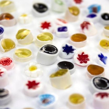 White Rough Cut Millefiori with shards is cut to irregular thicknesses with some shards and slivers - an affordable product perfectly suited to glass fusing projects.